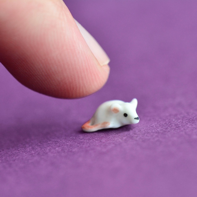 World’s Tiniest White Mouse Figurine